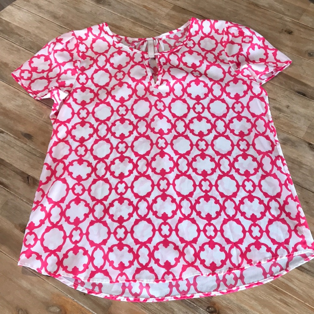 Pink and white patterned blouse, size large.